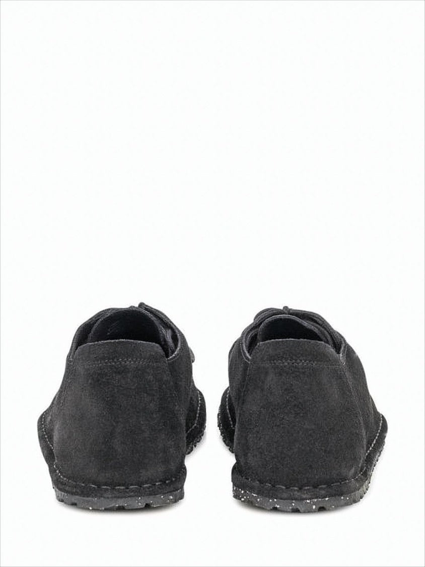 Moccasin-Inspired Suede Sneakers with Textured Rubber Sole