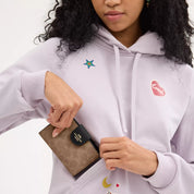 Coach Outlet Medium Corner Zip Wallet In Signature Canvas