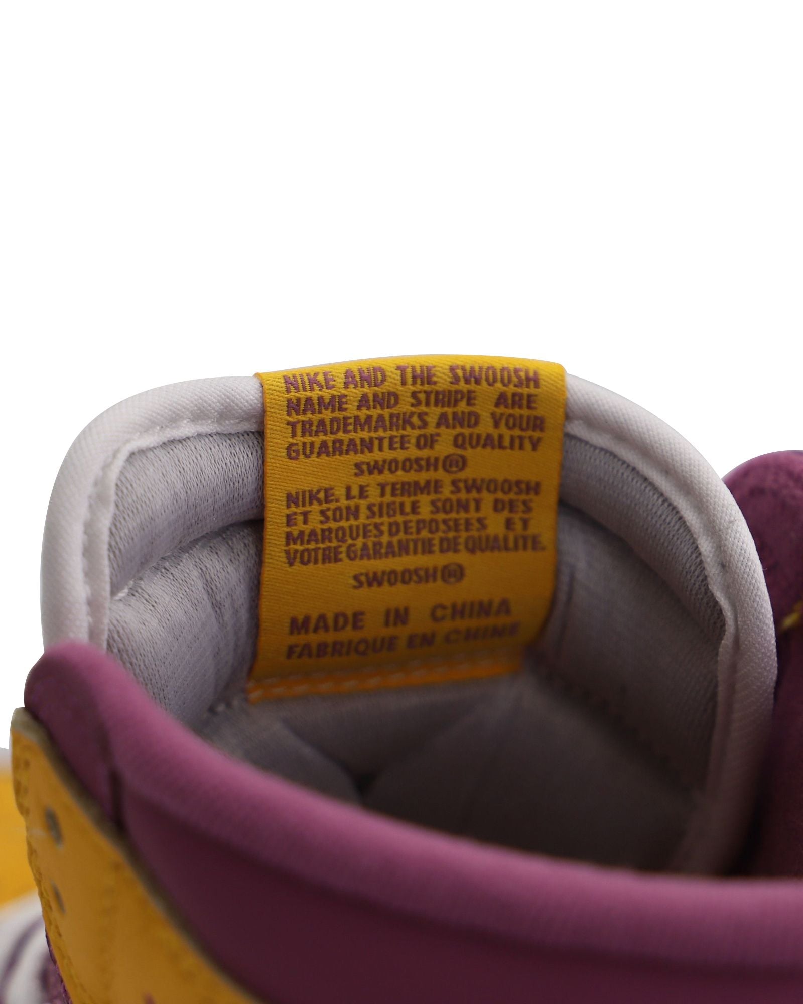 Nike Air Jordan 1 Retro High Top Sneakers in University Gold Light Bordeaux Leather