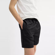 Coach Outlet Signature Swim Trunks In Recycled Polyester