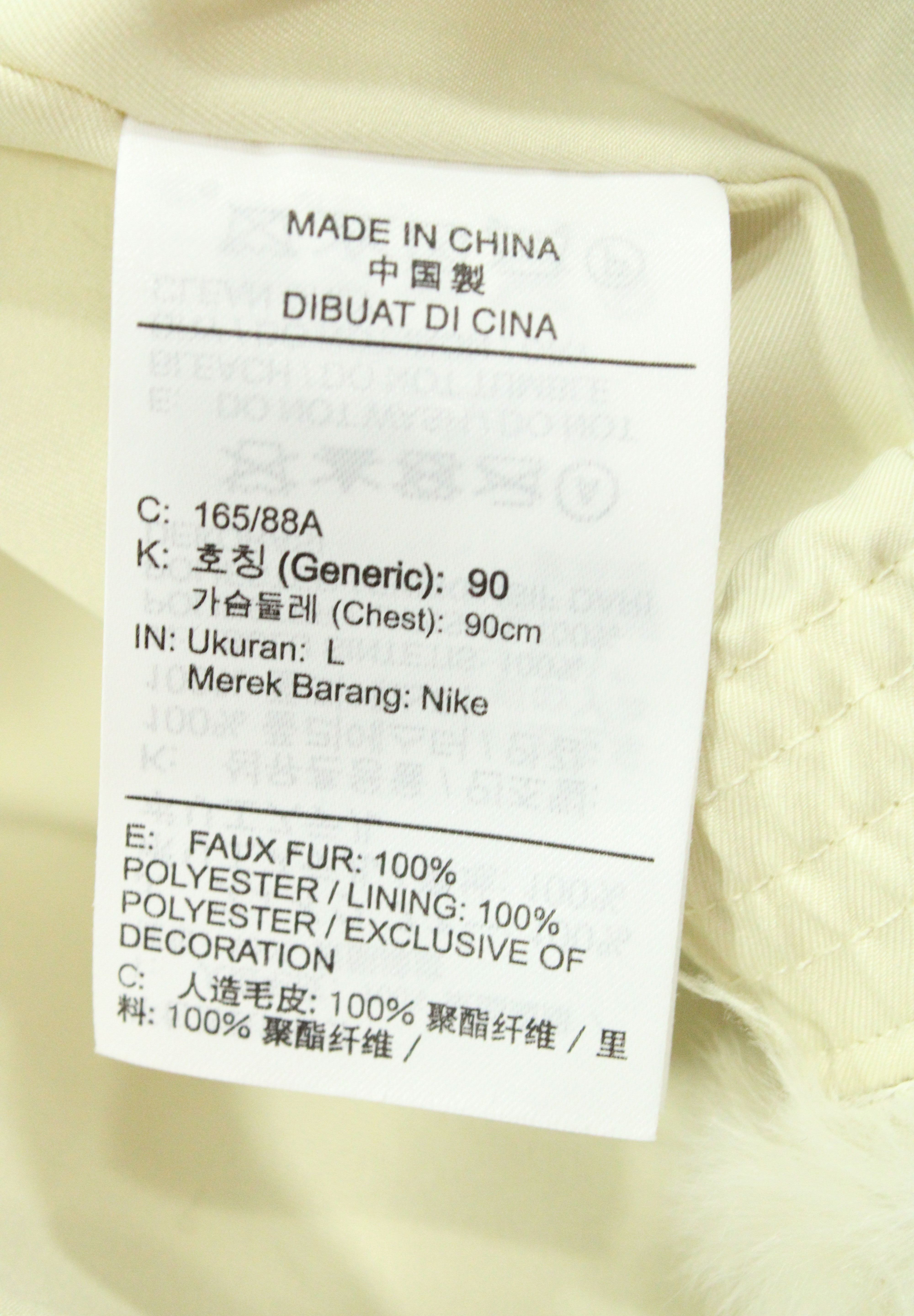 Nike Big Swoosh Jacket in Cream Faux Fur