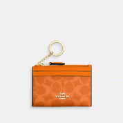 Coach Outlet Mini Skinny Id Case In Signature Canvas