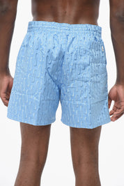 SWIM Solid-Color Shorts with All-Over Embroidered Logo