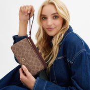 Coach Outlet Double Zip Wallet In Signature Canvas