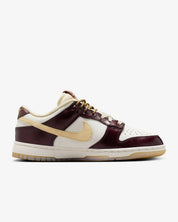 Women's Dunk Low Lx Year Of The Snake Shoes In Sail/burgundy Crush/team Gold