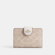 Coach Outlet Medium Corner Zip Wallet In Signature Canvas