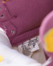 Nike Air Jordan 1 Retro High Top Sneakers in University Gold Light Bordeaux Leather