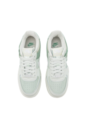 Layered White Sneaker with Pastel Green Accents