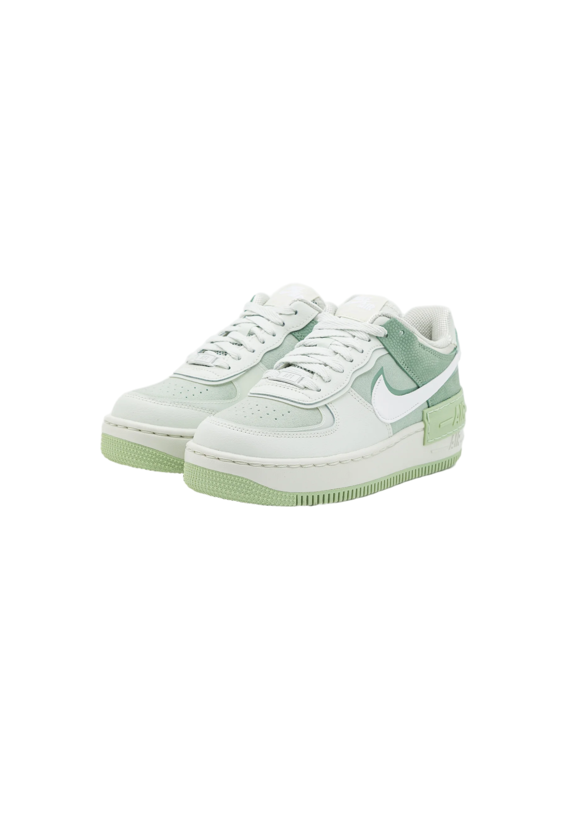 Layered White Sneaker with Pastel Green Accents