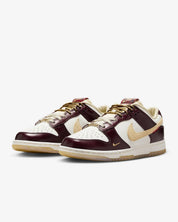 Women's Dunk Low Lx Year Of The Snake Shoes In Sail/burgundy Crush/team Gold