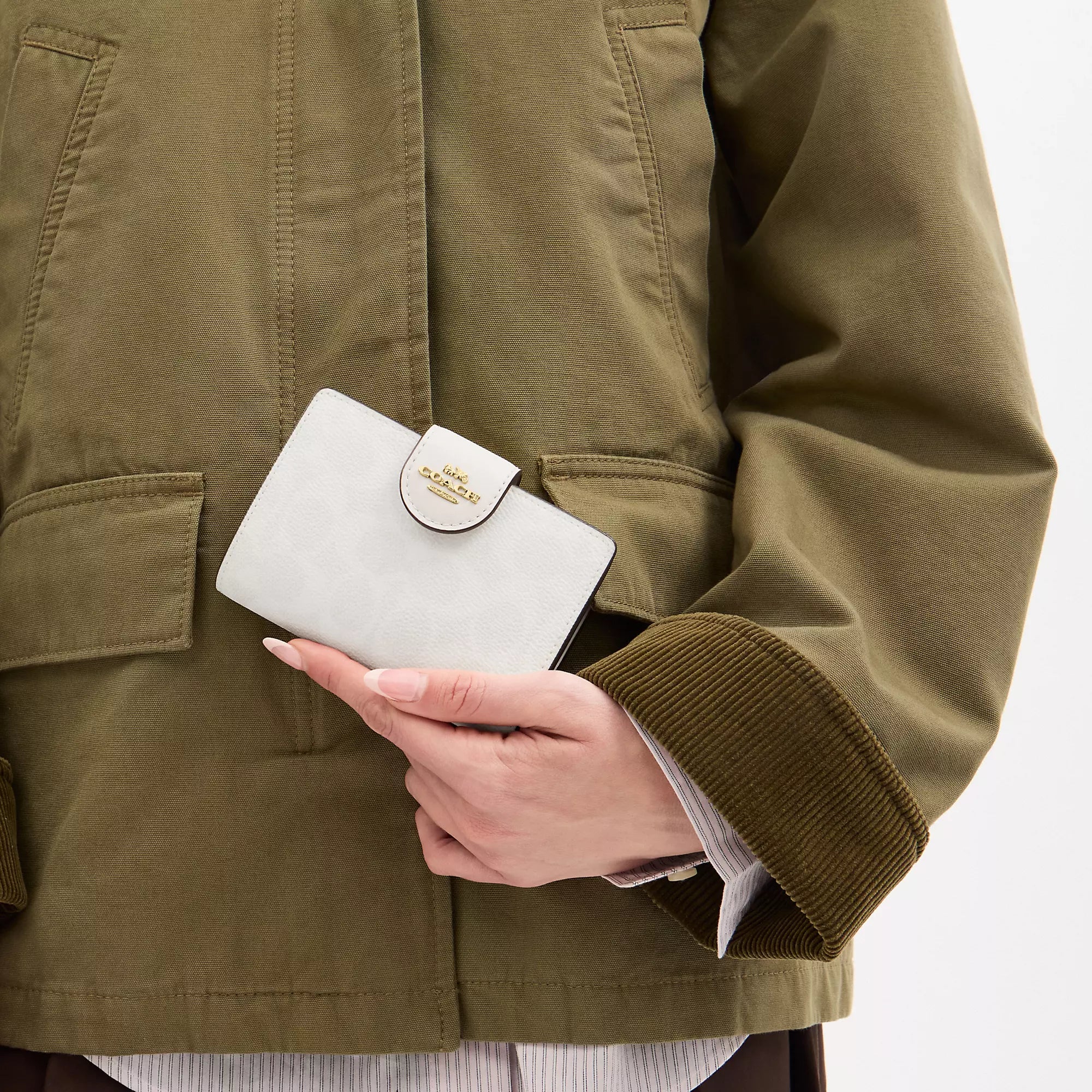 Coach Outlet Medium Corner Zip Wallet In Signature Canvas