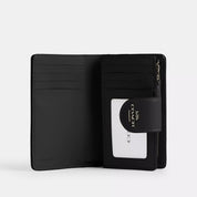 Coach Outlet Medium Corner Zip Wallet In Signature Canvas