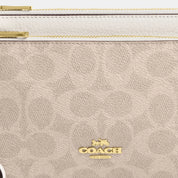 Coach Outlet Double Zip Wallet In Signature Canvas
