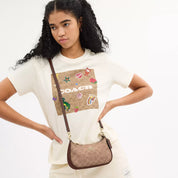 Coach Outlet Teri Mini Crossbody Bag In Signature Canvas