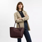 Coach Outlet City Tote Bag In Signature Canvas