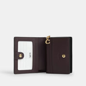 Coach Outlet Snap Wallet In Signature Canvas