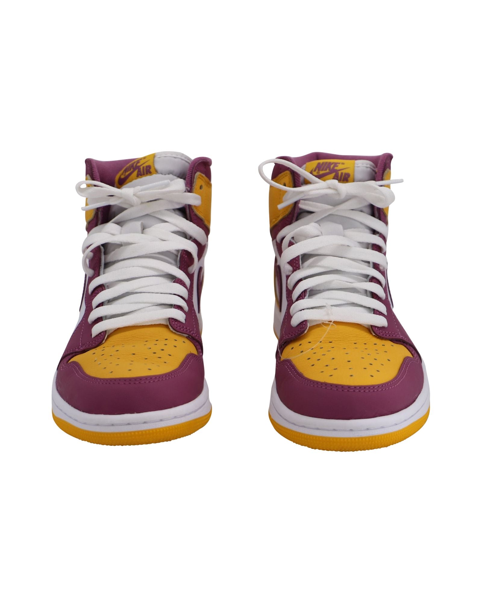 Nike Air Jordan 1 Retro High Top Sneakers in University Gold Light Bordeaux Leather
