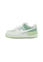 Layered White Sneaker with Pastel Green Accents