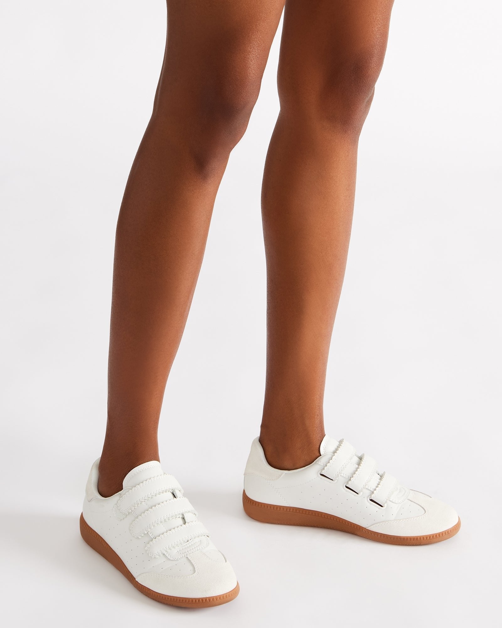 STEVEMADDEN_SHOES_MOMENTUM_WHITE_LEGS-DOWN.jpg
