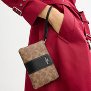 Coach Outlet Corner Zip Wristlet In Signature Canvas With Stripe