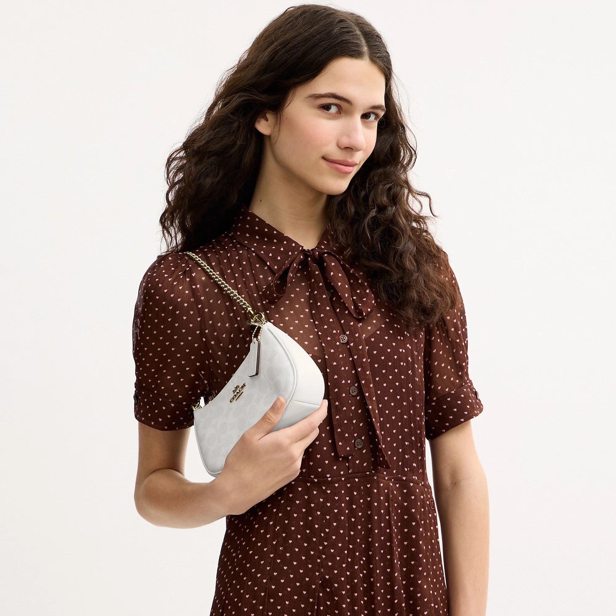 Coach Outlet Teri Mini Crossbody Bag In Signature Canvas