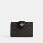 Coach Outlet Medium Corner Zip Wallet In Signature Canvas