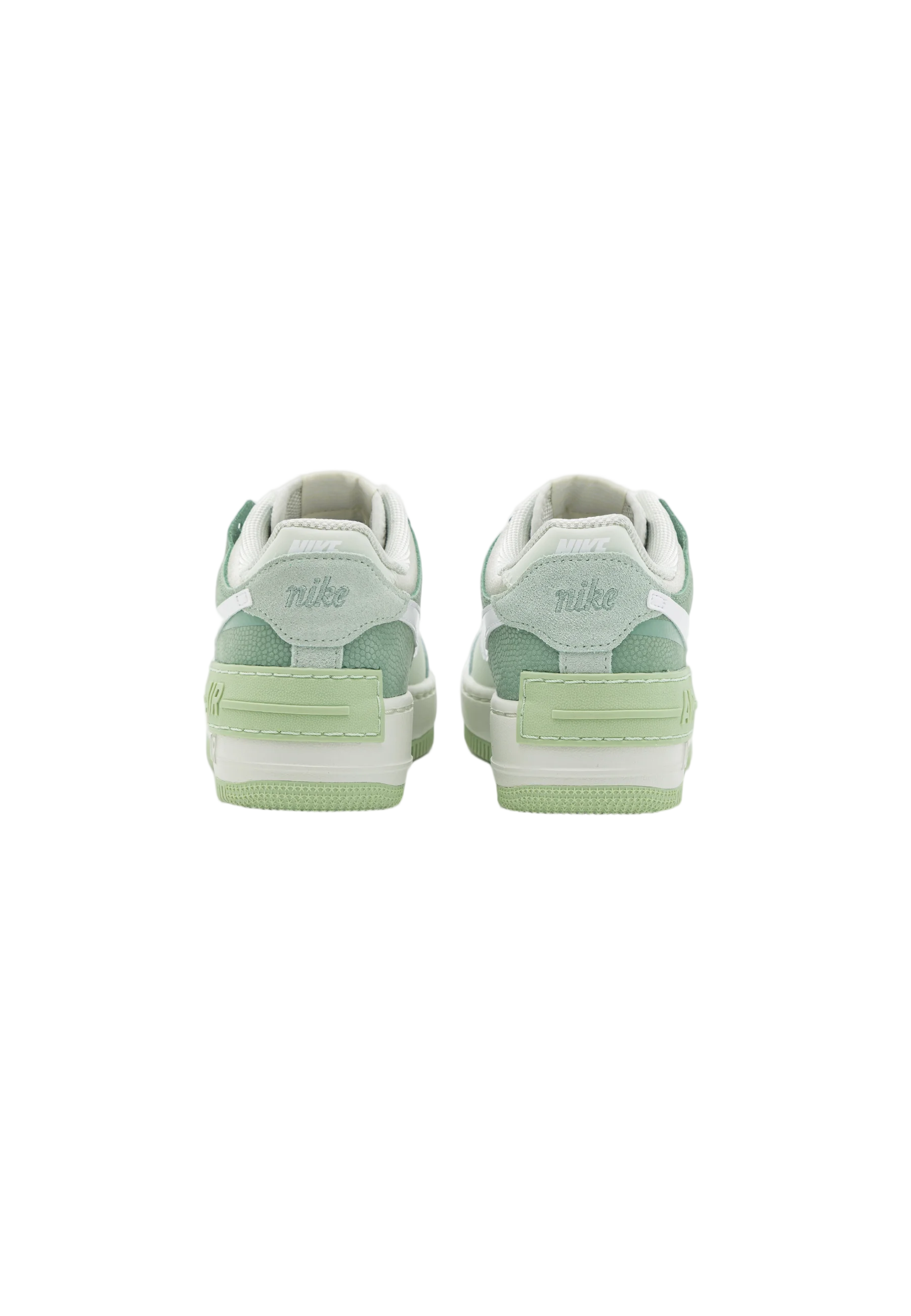 Layered White Sneaker with Pastel Green Accents