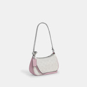 Coach Outlet Teri Mini Crossbody Bag In Signature Canvas